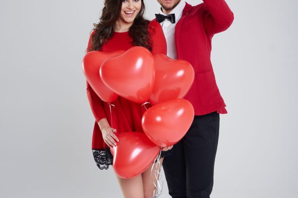 Adorable couple with valentines accessories